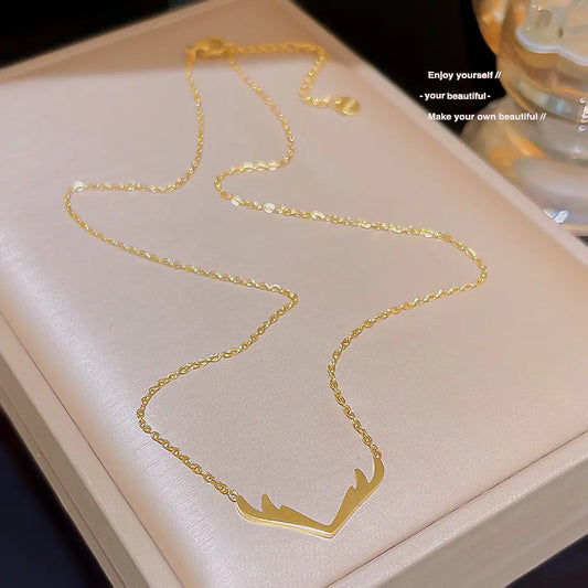 Collier chic en titane avec bois de cerf