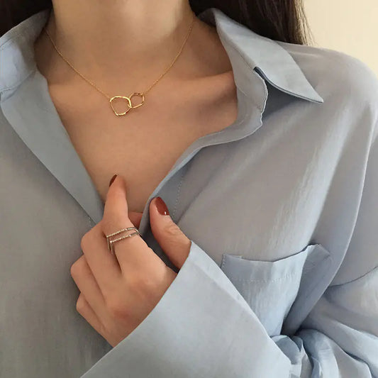 Collier ras du cou minimaliste avec pendentif double anneau